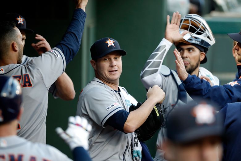 Houston Astros pitcher Chris Sampson walks to the dugout after