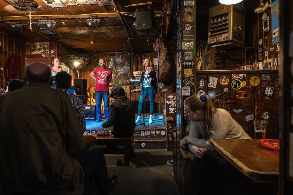 Melissa Plagemann, Marcus Shelton and Ksenia Popova of Opera on Tap perform at the Blue Moon. (Dean Rutz / The Seattle Times)