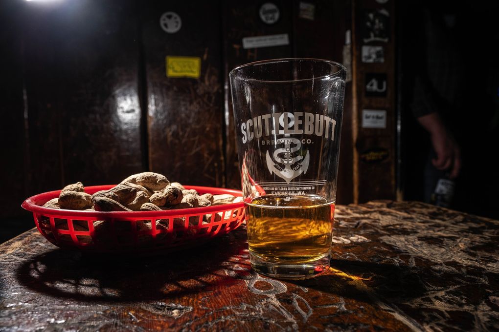Beer and peanuts (they let you throw the peanut shells on the floor!) at the Blue Moon. (Dean Rutz / The Seattle Times)