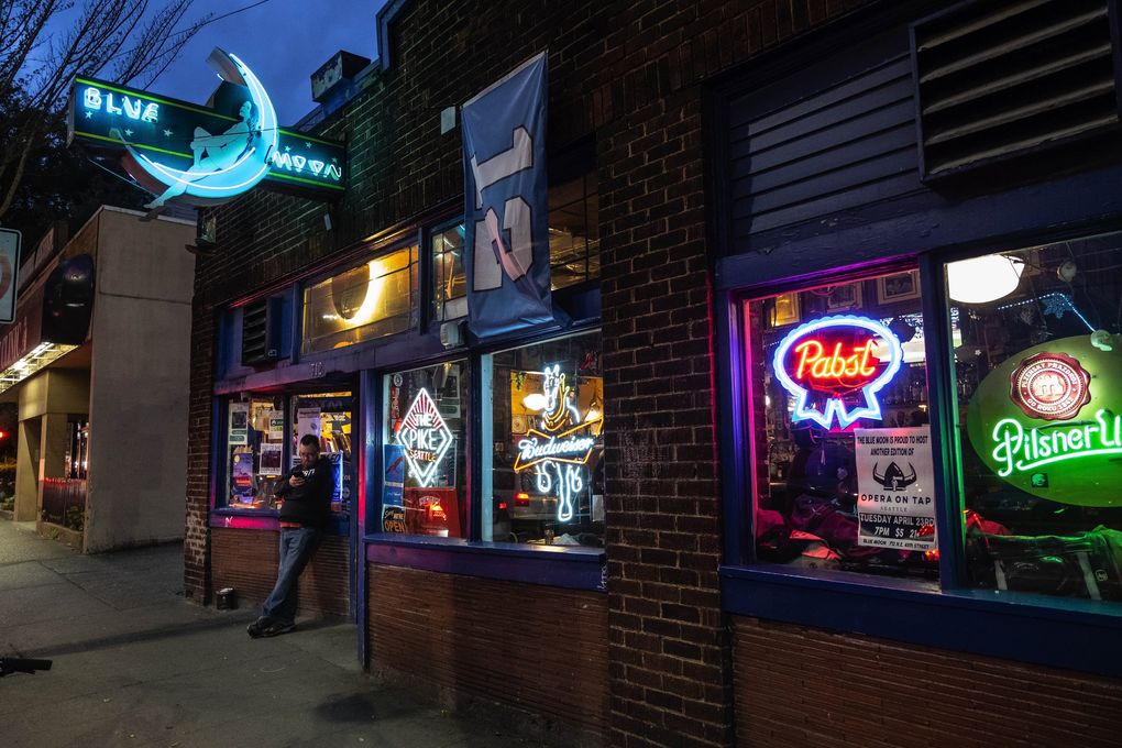 The storied Blue Moon tavern, home to artists and leftists for decades, celebrates its 85th anniversary this year. (Dean Rutz / The Seattle Times)