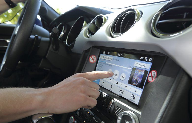 In a photo from AAA, using an infotainment system in a car. Voice activation can let a driver watch the road instead of dealing with buttons or touch-screen icons, but the systems still demand the driver’s attention. (AAA via The New York Times) –FOR EDITORIAL USE ONLY WITH NYT STORY AUTOS DISTRACTED DRIVING BY PAUL STENQUIST FOR MAY 3, 2019. ALL OTHER USE PROHIBITED. — XNYT5 XNYT5