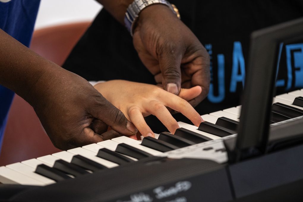 Kids get an introduction to keyboards at JazzED. (Dean Rutz / The Seattle Times)
