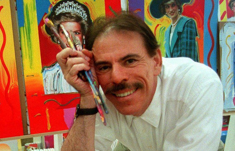 Artist Peter Max poses with his acrylic paintings of Diana, Princess of Wales, at his studio in New York, Wednesday, Aug. 26, 1998. Max based his paintings on the pictures of British Royal Family photographer Tim Graham and will auction them via the Internet to benefit the Red Cross and Red Crescent Societies worldwide .  (AP Photo/Bebeto Matthews)