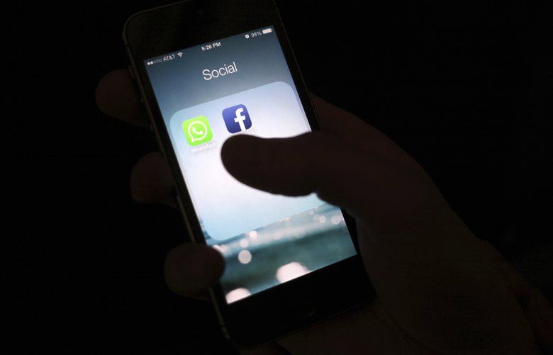 FILE – This Feb. 19, 2014, file photo shows the Facebook app icon on an iPhone in New York. Panic over what children are picking up over the Internet sweep social media on a regular basis. In the most recent, children are purportedly encouraged to complete harmful tasks. Though the so-called Momo challenge is believed to be a hoax, other “challenges†and trends should cause concern. (AP Photo/Karly Domb Sadof, File)