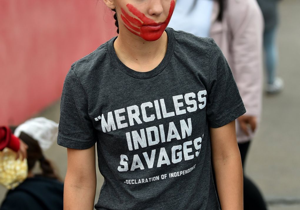 Rosalie Fish of Muckleshoot Tribal painted her face with a hand print to raise awareness for Missing and Murdered Indigenous Women. (Tyler Tjomsland / Spokesman-Review)