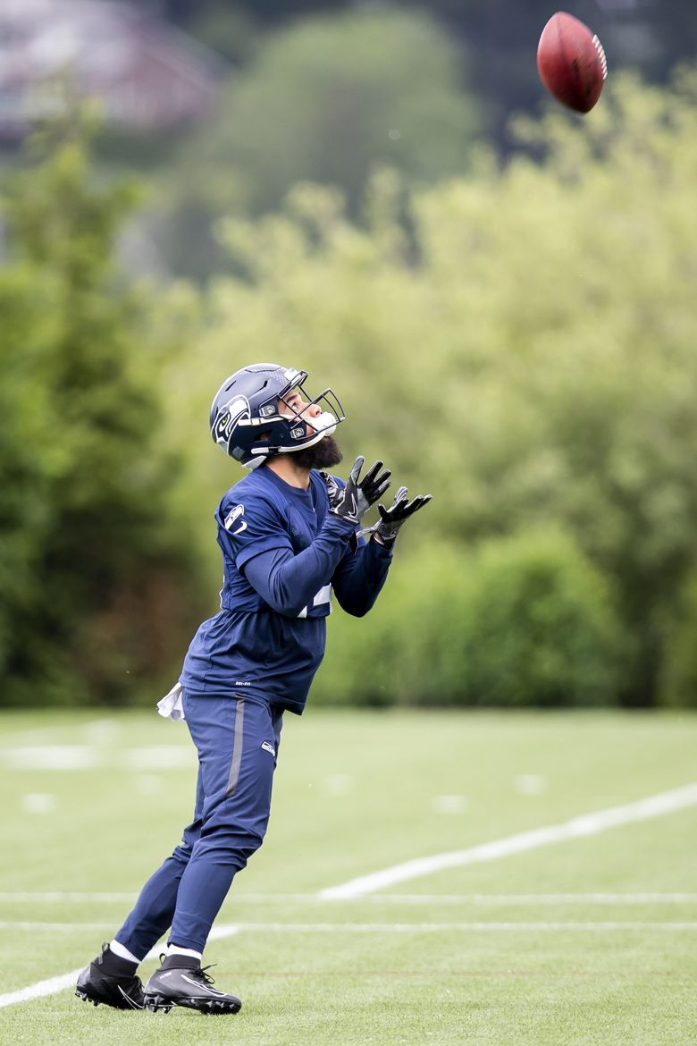 Seattle Seahawks wide receiver John Ursua walks off the field after News  Photo - Getty Images