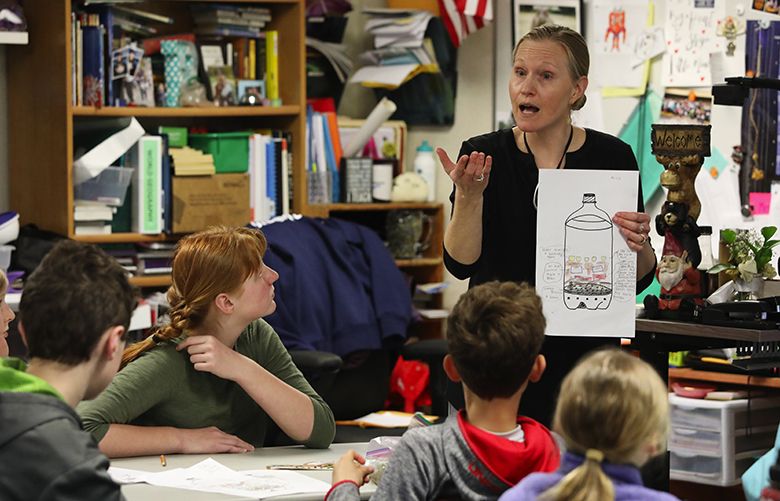 Sadie Brumley, at Cathcart Elementary, teaches her fourth, fifth and sixth graders in a “highly capable class” on how to make a bioreactor, Thursday, April 11, 2019 in  Snohomish. Brumley had taken a workshop with Washington Green Schools and said the program dovetails nicely with what she had already been teaching.