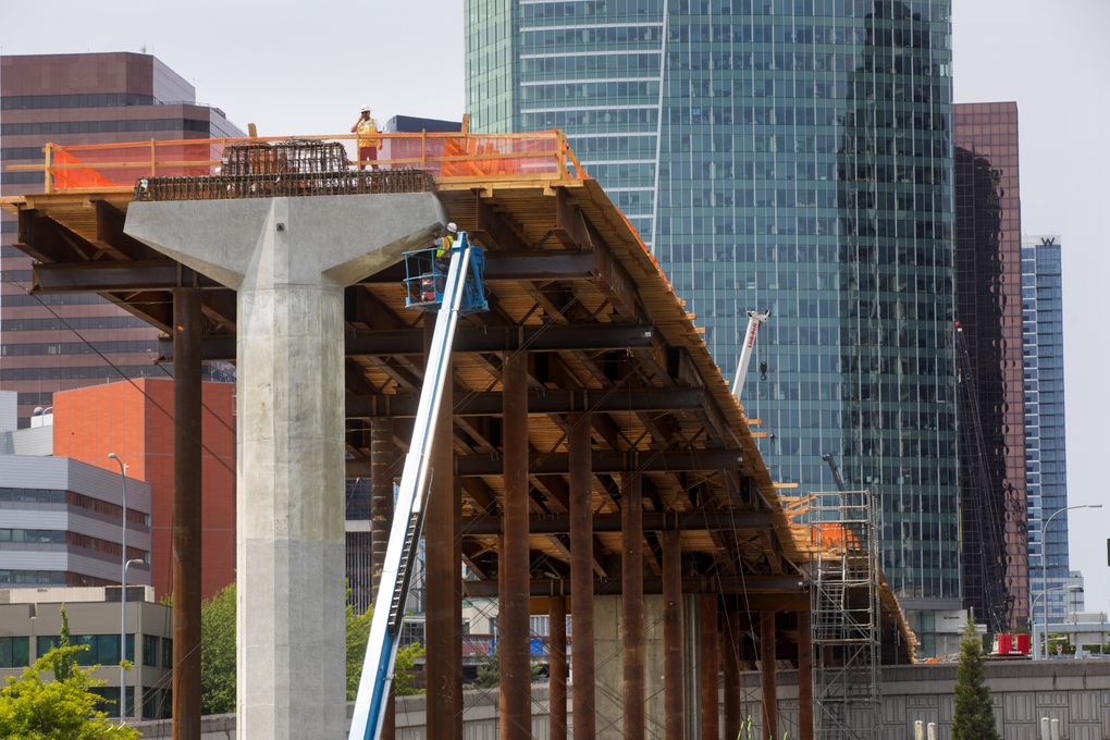In implementing ST3, Seattle can learn from Bellevue’s example. Bellevue initially sought an expensive downtown light-rail tunnel, but after negotiations and delays, Bellevue and Sound Transit agreed to a shorter downtown tunnel (pictured under construction in June 2018) and split the cost.
(Ellen M. Banner / The Seattle Times, File)