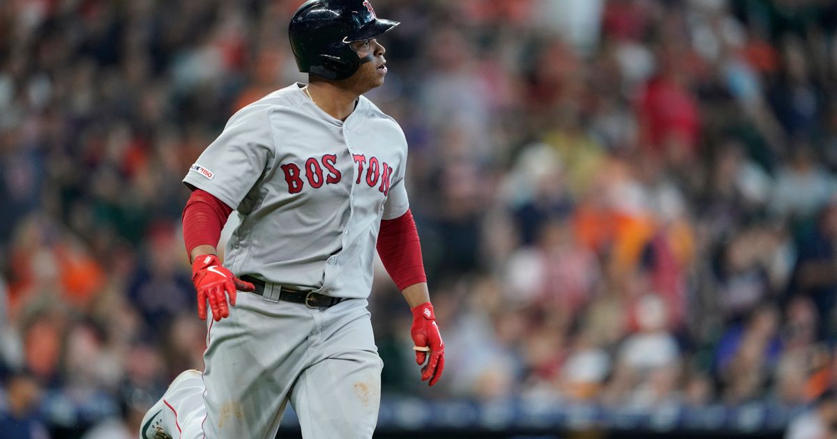 Houston Astros' Yuli Gurriel scores past Boston Red Sox catcher Christian  Vazquez on a sacrifice flay by Jose Altuve during the eighth inning in Game  1 of baseball's American League Championship Series