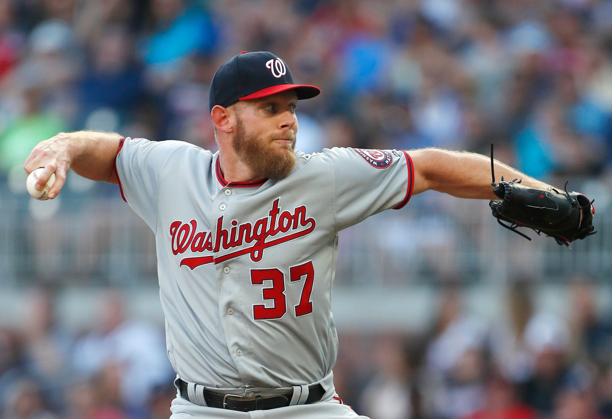 Strasburg strikes out 11, Nationals hold off Braves 5-4