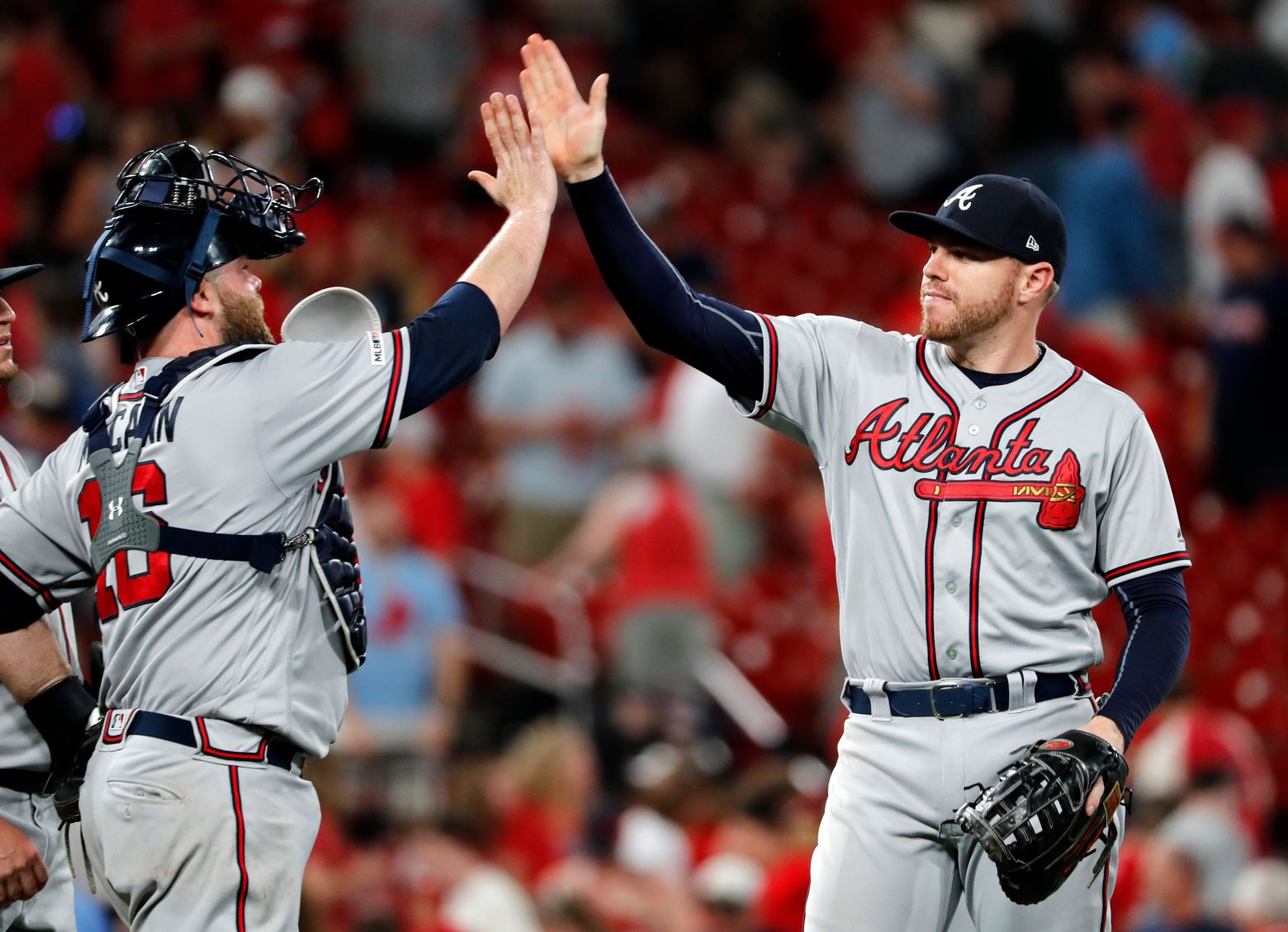 McCann's bases-loaded walk lifts Braves past Cardinals in 10