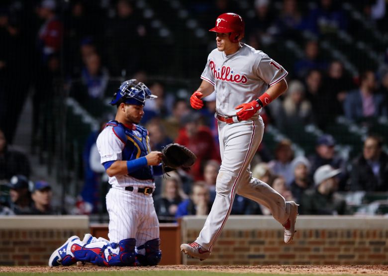 J.T. Realmuto homers in the 10th inning as the Phillies come all