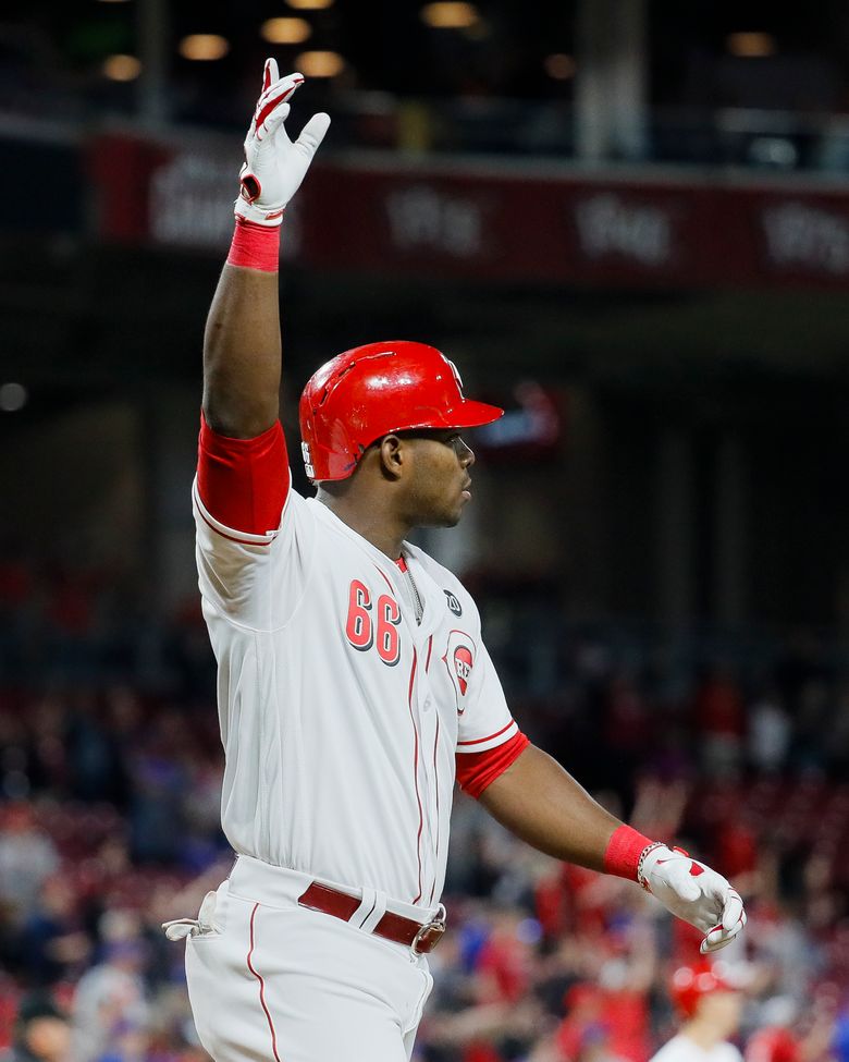Yasiel Puig singles in 10th as Reds rally past Cubs 6-5