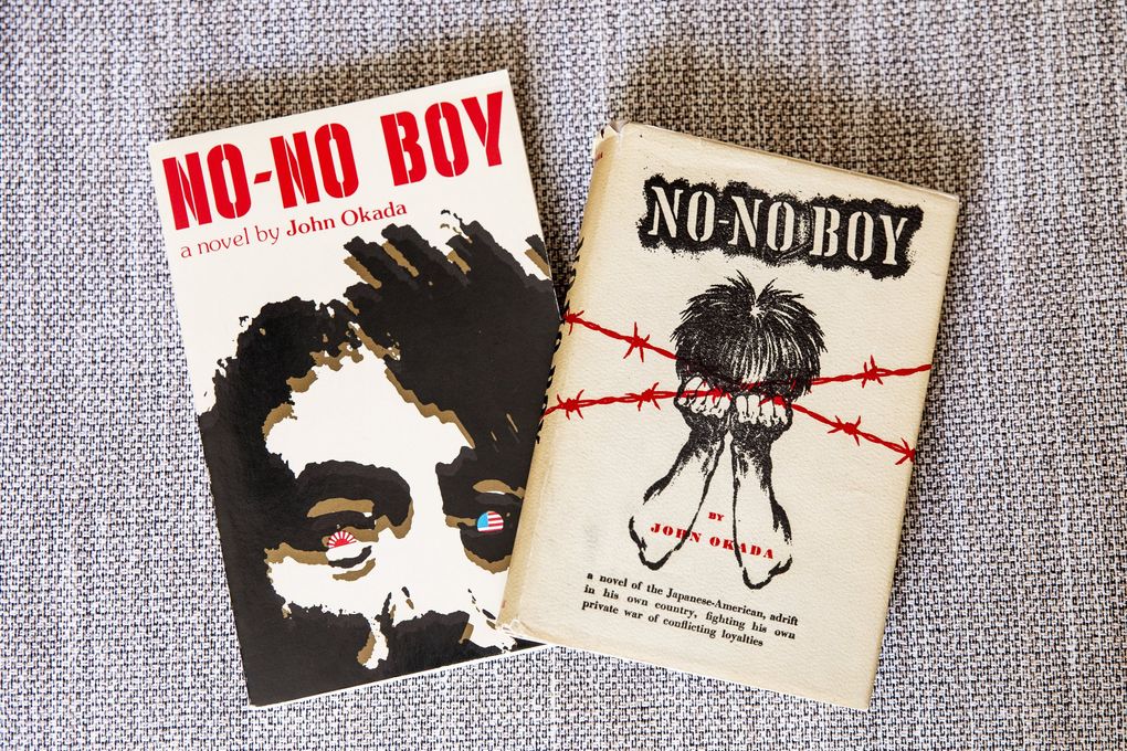 The 1957 edition of “No-No Boy” by John Okada is shown at at right, next to the first paperback edition published by the University of Washington Press in the 1970s. The University of Washington Press has been the sole publisher of “No-No Boy” since 1979. (Bettina Hansen / The Seattle Times)
