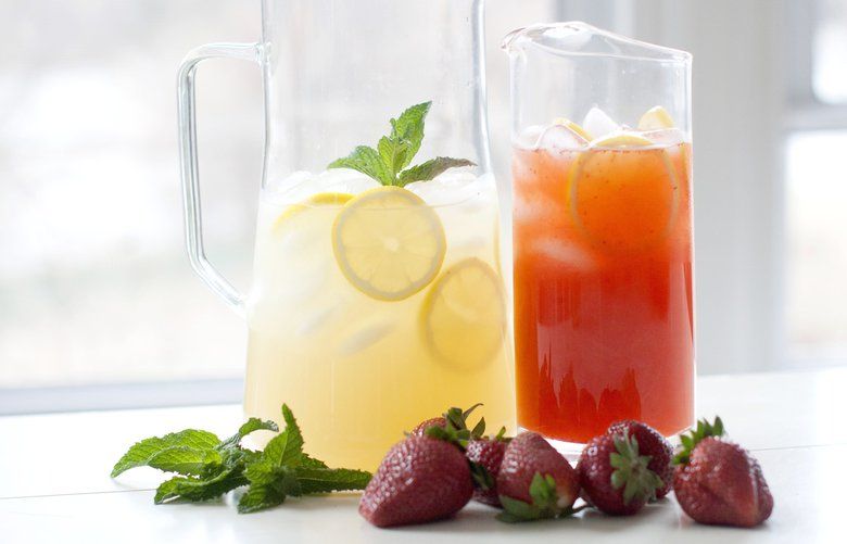 This April 14, 2014 photo shows strawberry lemonade, right, and lemonade in Concord, N.H. (AP Photo/Matthew Mead)
