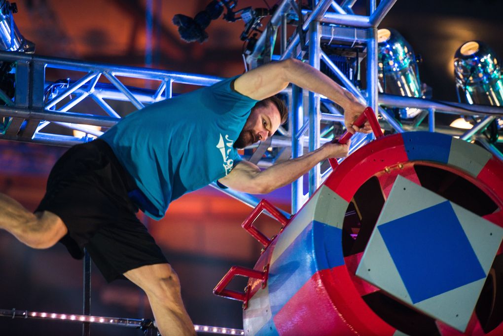 Justin Gielski competes during “American Ninja Warrior” at the Tacoma Dome last month. Gielski made it to the national finals in Las Vegas in season seven but has never managed to scale the Warped Wall and hit the buzzer. “This is my redemption tour,” he says. (Amanda Snyder / The Seattle Times)