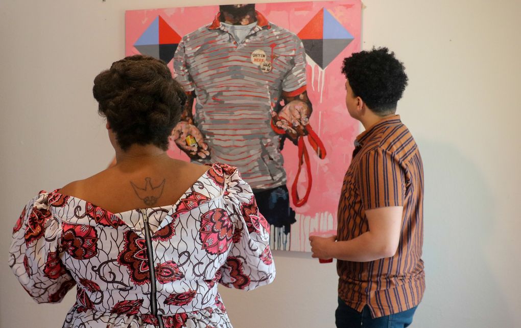 Portland-based artist Jeremy Okai Davis’ bold, incisive paintings hang in one of the upstairs rooms of Wa Na Wari. (Courtesy of Wa Na Wari)