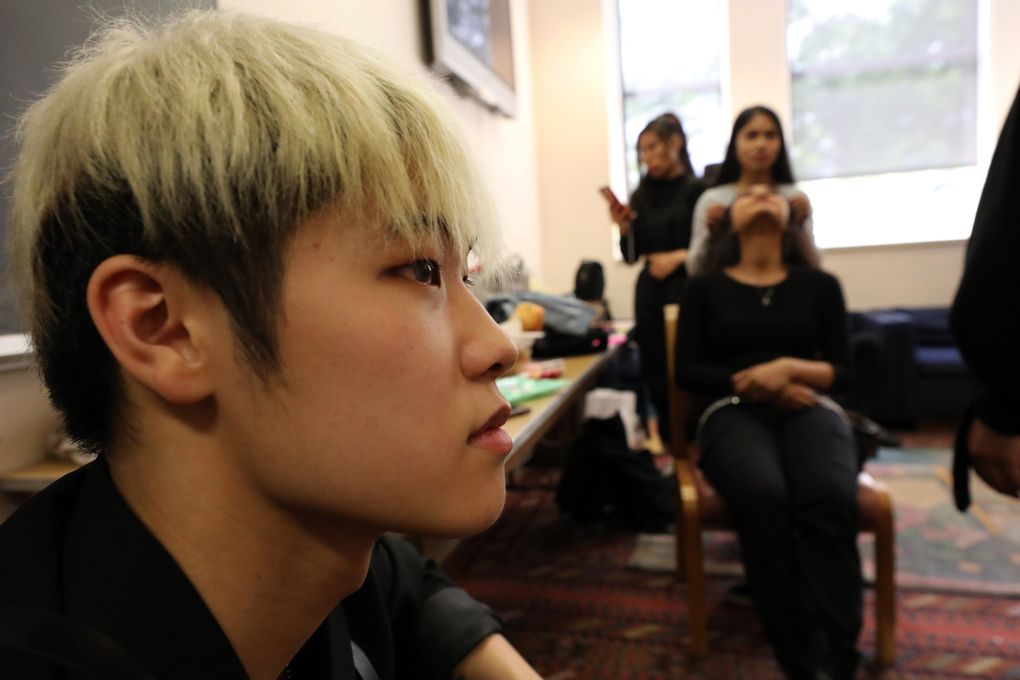 Phillip Lao and other members of B2E wait in the green room of the Broadway Performance Hall before their audition. He says, “the most fun I have ever had is performing with this group.” (Alan Berner / The Seattle Times)