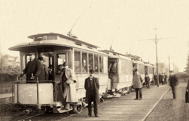 THEN: This view, probably looking southeast at five streetcars heading north, dates from 1890, 17 years before Ballard annexed to Seattle.