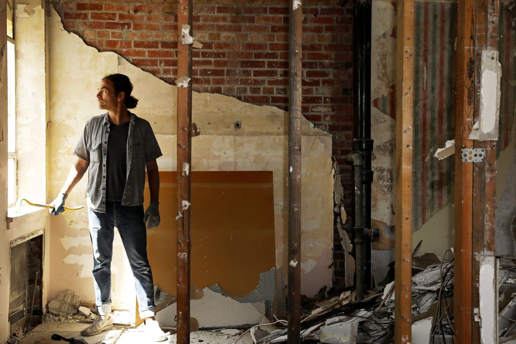 “Some people are only down on Seattle,” says Greg Lundgren. “I’m not throwing in the towel on Seattle. The question is: Are you going to sit around and wait for somebody else to write the check, or are you going to build the version you can?” (Ken Lambert / The Seattle Times)