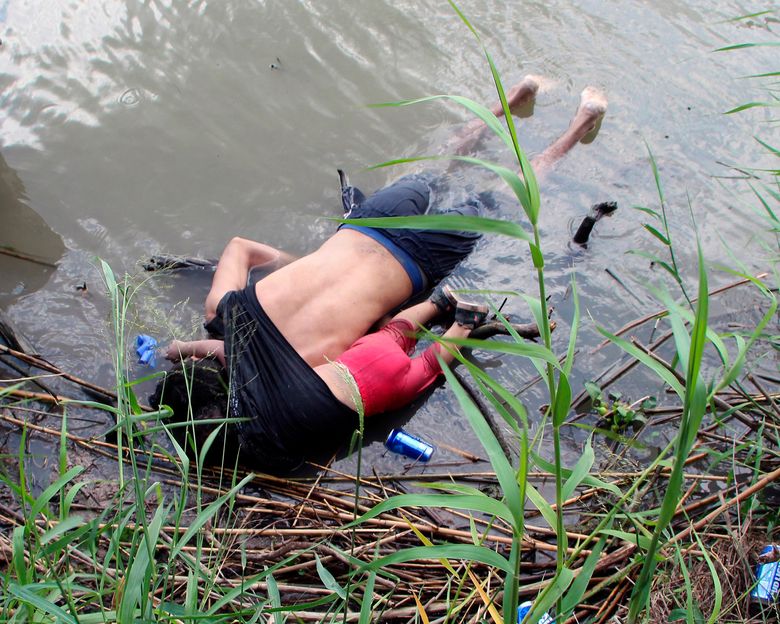 The bodies of Salvadoran migrant Oscar Alberto Martinez Ramirez and his nearly 2-year-old daughter, Valeria, lie on the bank of the Rio Grande in Matamoros, Mexico, on June 24, 2019, after they drowned trying to cross the river to Brownsville, Texas. Martinez’ wife, Tania told Mexican authorities she watched her husband and child disappear in the strong current. Oscar Alberto Martinez Ramirez, was frustrated because the family from El Salvador was unable to present themselves to U.S. authorities and request asylum. (Abraham Pineda-Jacome/EFE/Zuma Press/TNS)