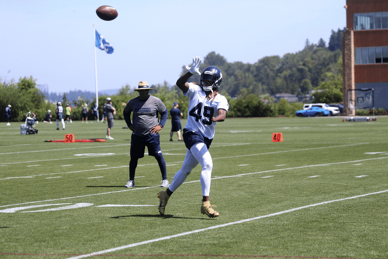 Shaquem Griffin makes a juggling catch during the final day of Seahawks minicamp at the VMAC in Renton. (Ken Lambert / The Seattle Times