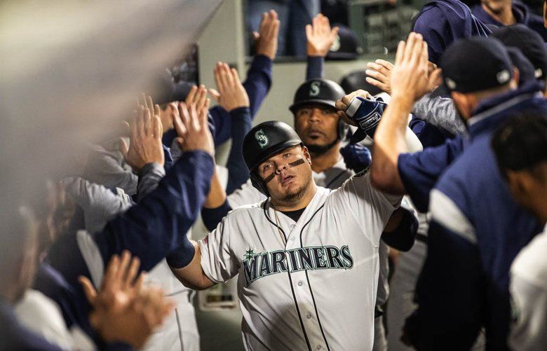 Daniel Vogelbach is back in the dugout with a 3-run homer in the 8th. The Minnesota Twins played the Seattle Mariners Thursday, May 16, 2019 at T-Mobile Park in Seattle, WA. 210257