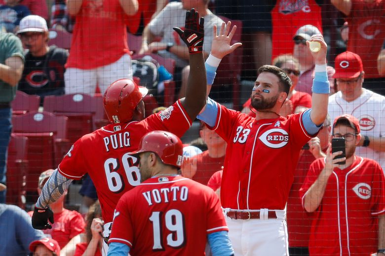 Winker paces Reds with 5 RBIs in 11-3 rout over Rangers