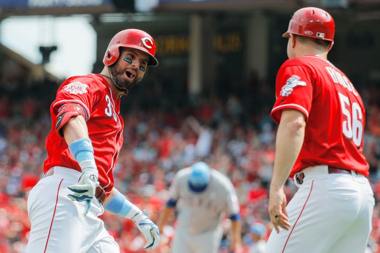 Cincinnati Reds' Jesse Winker bats during the fourth inning of