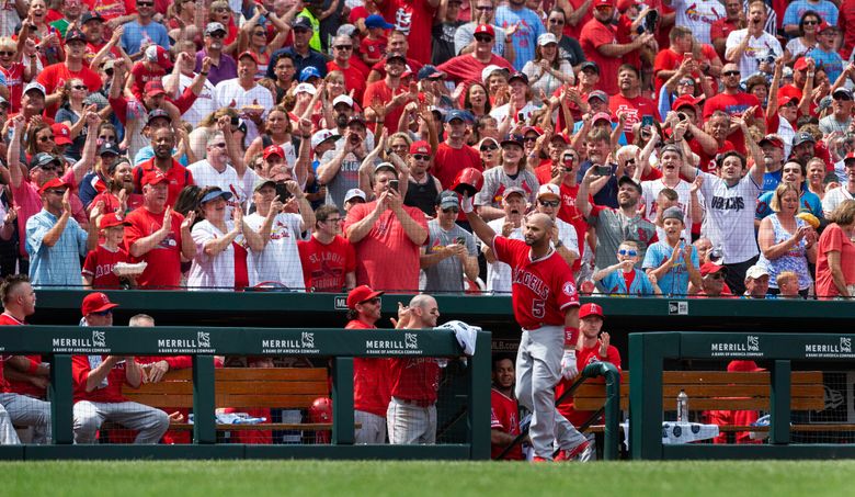 Pujols pounds Cardinals past Reds