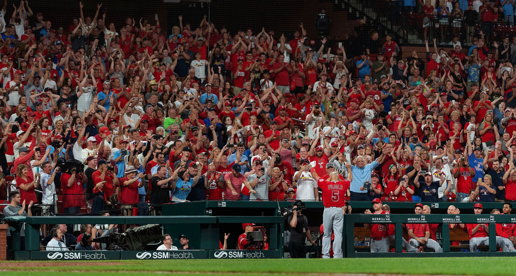 Albert Pujols concludes St. Louis return with 2 hits, Molina jersey swap