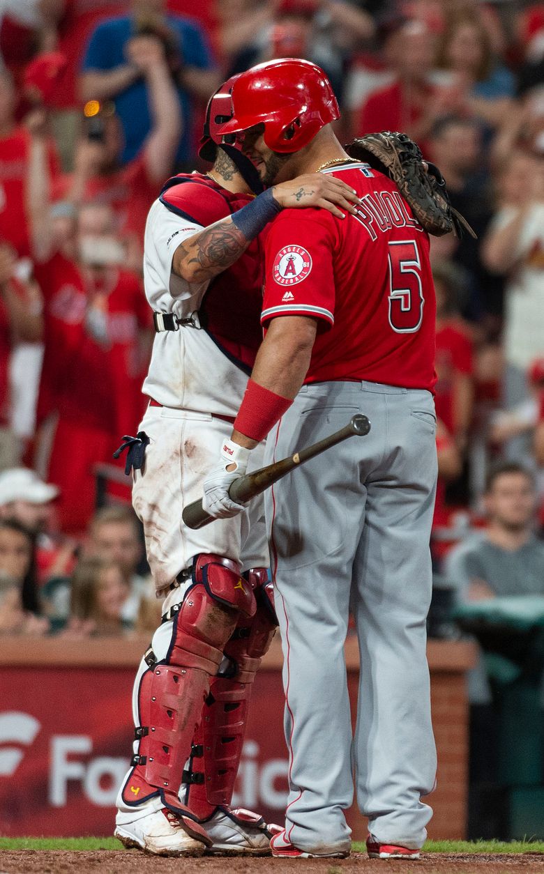 Albert Pujols concludes St. Louis return with 2 hits, Molina