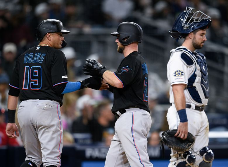 Miami Marlins' Martin Prado hits a single during the third inning