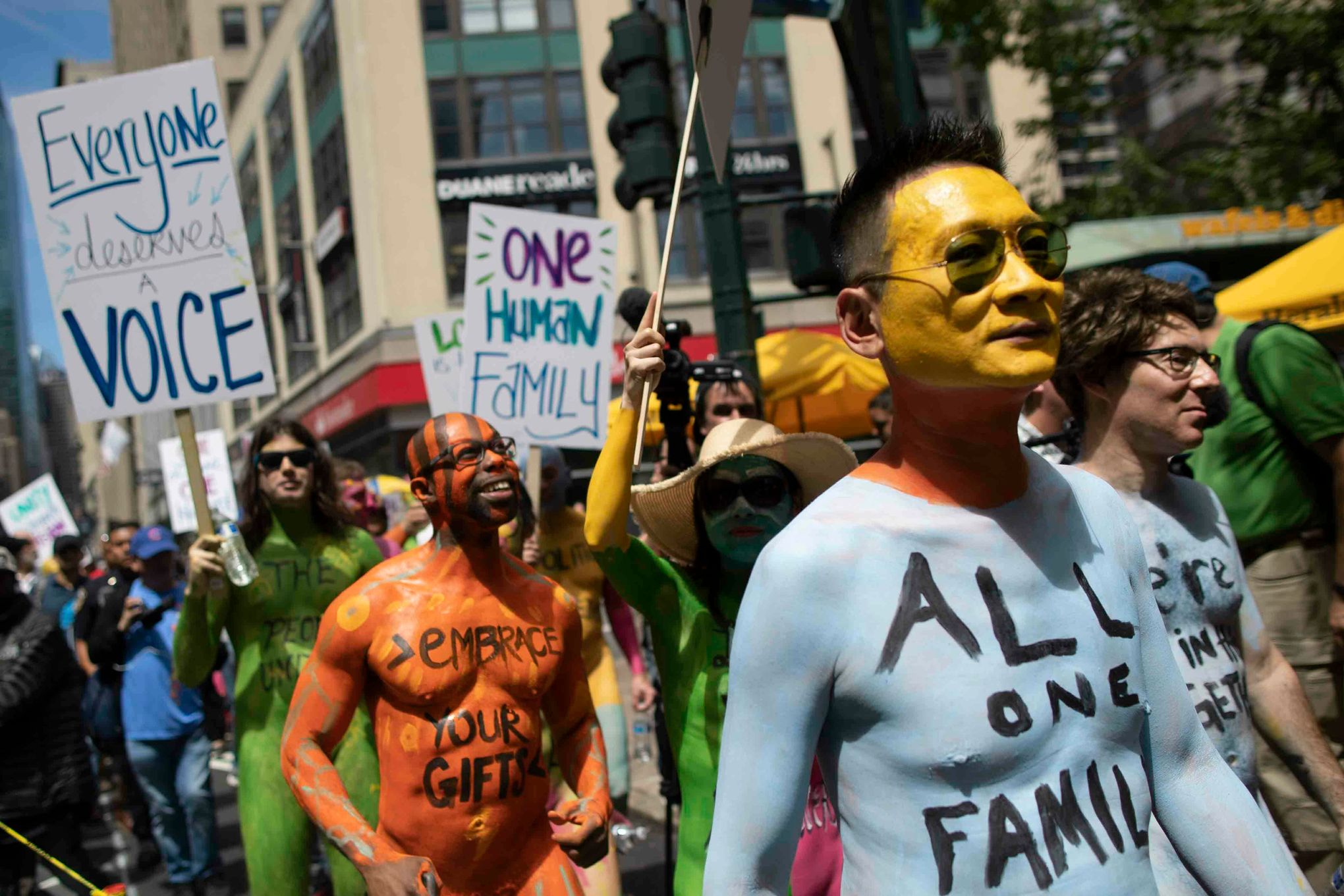 Protesters strip, get painted in Times Square | The Seattle Times