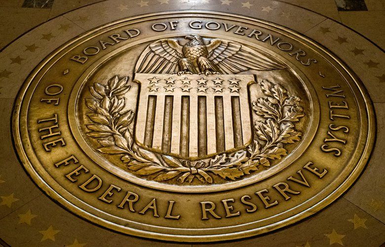 FILE – This Feb. 5, 2018, file photo shows the seal of the Board of Governors of the United States Federal Reserve System in the ground at the Marriner S. Eccles Federal Reserve Board Building in Washington. President Donald Trump says on Twitter he will nominate economists Christopher Waller and Judy Shelton to fill two vacancies on the Federal Reserve Board of Governors. (AP Photo/Andrew Harnik, File) NYHK208 NYHK208