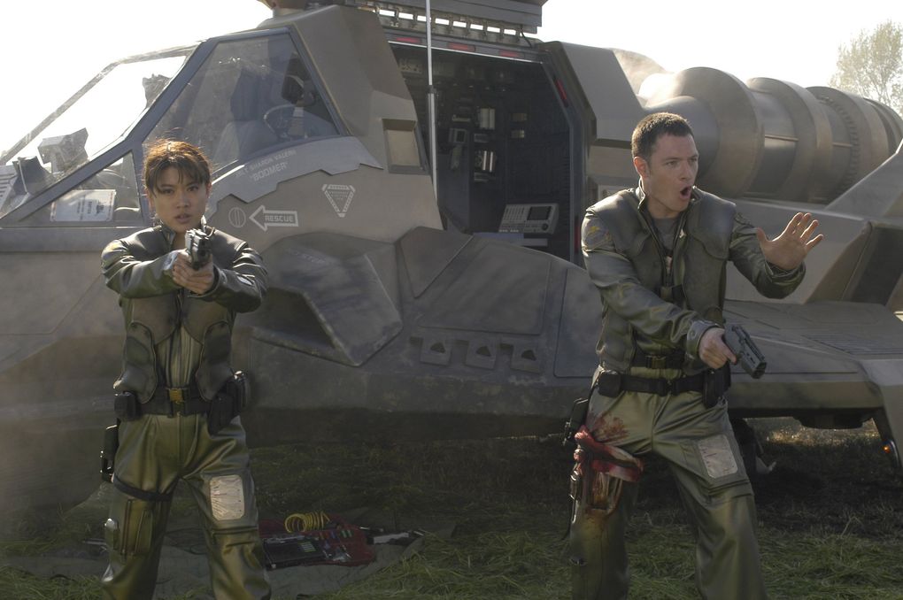 Grace Park and Tahmoh Penikett in “Battlestar Galactica.” (Alan Zenuk / Sci-Fi Channel)