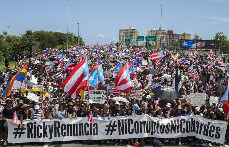 Puerto Ricans protest over unused emergency aid, demand