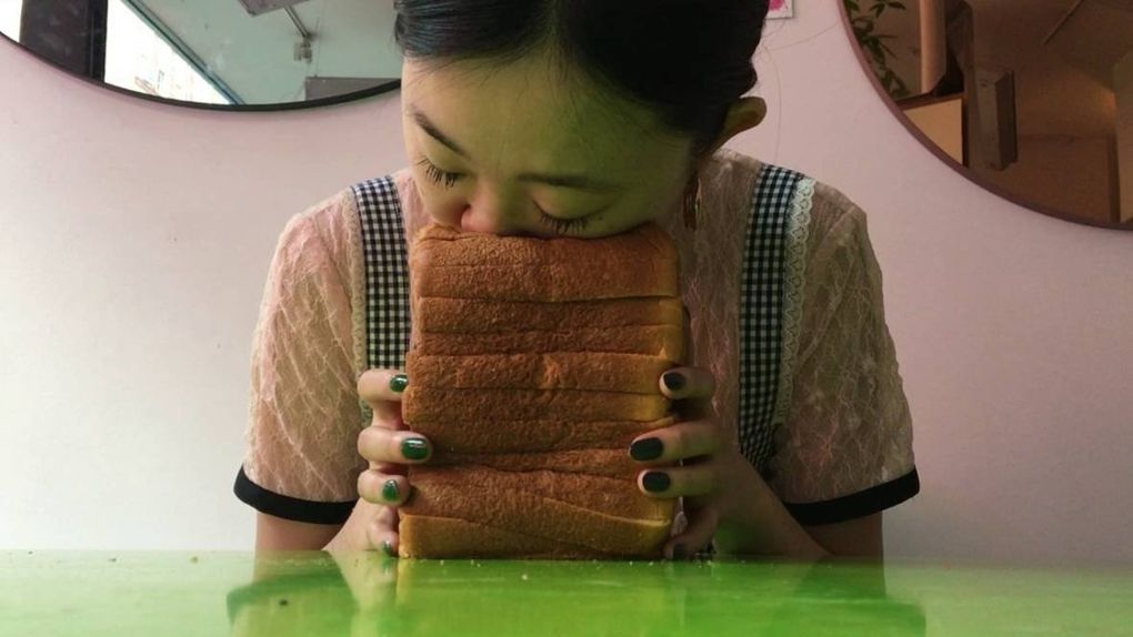 Brooklyn-based Bread Face, who has amassed a social-media following for smashing her face into bread, will have an interactive installation at Seattle Art Fair. People will be invited to touch and play with bread products, which will then be placed on display. (Bread Face)
