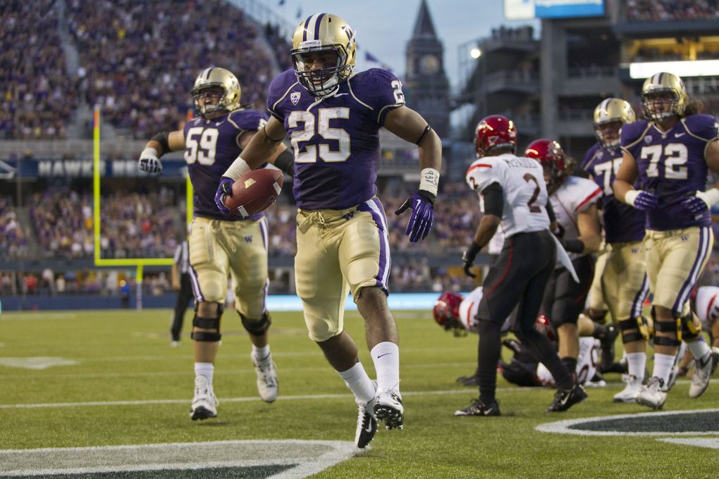 Washington’s Bishop Sankey rumbles into the end zone in 2012. (Dean Rutz / The Seattle Times)
