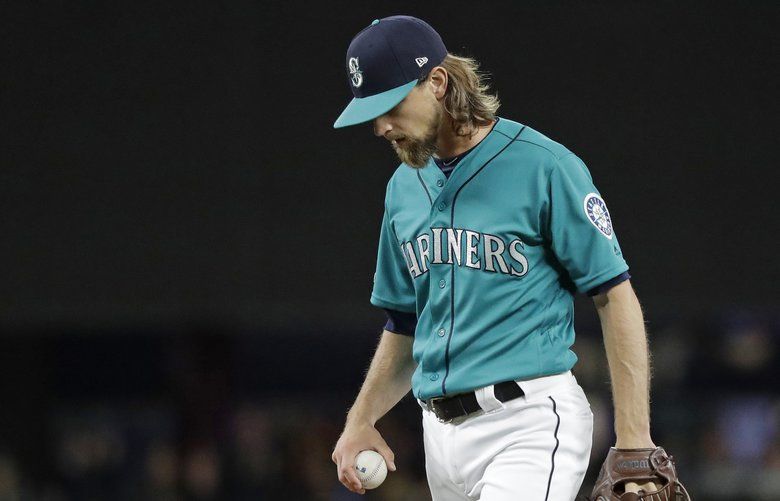 Seattle Mariners pitcher Felix Hernandez is greeted by teammates after he  threw a perfect baseball game against the Tampa Bay Rays, Wednesday, Aug.  15, 2012, in Seattle. (AP Photo/Ted S. Warren Stock