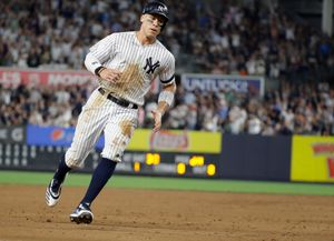 Oh, baby! D-backs rookie dad wins Yankee Stadium debut, 4-2