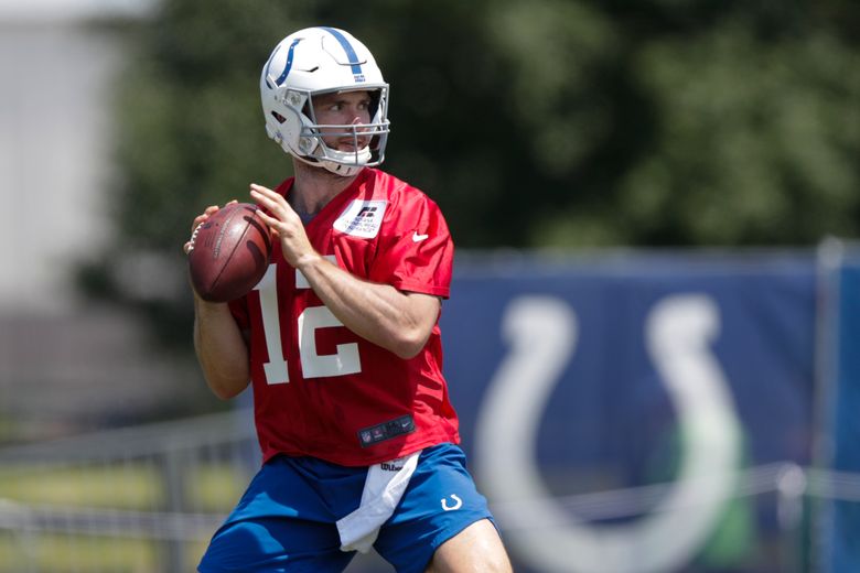 Luck returns to field as Colts open training camp workouts