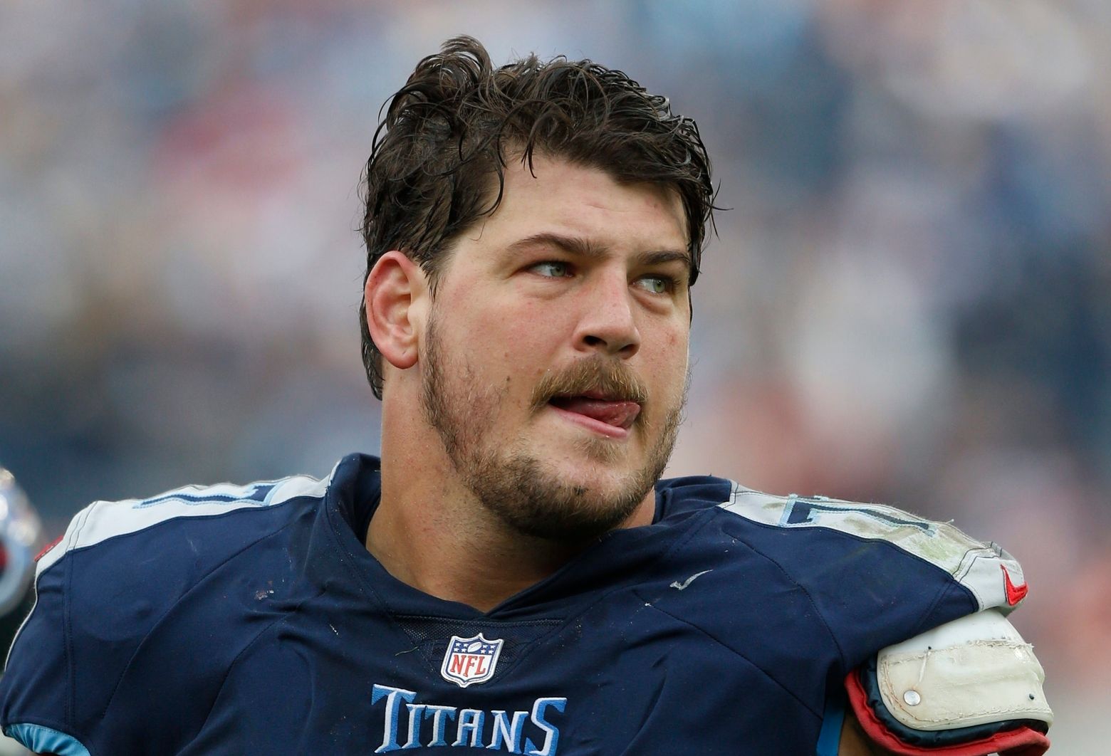 Pro Bowl left tackle Taylor Lewan reports for Titans camp