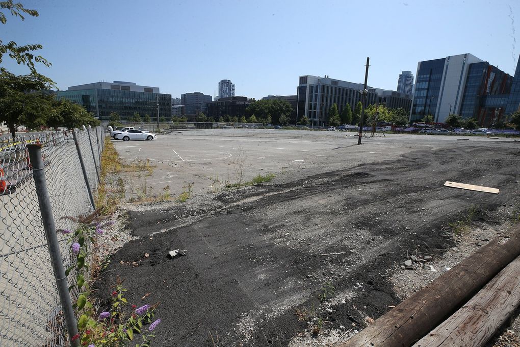 This empty city block is part of the Mercer Mega Block. This view is from Dexter Avenue North and Roy Street, looking southeast. (Greg Gilbert / The Seattle Times)