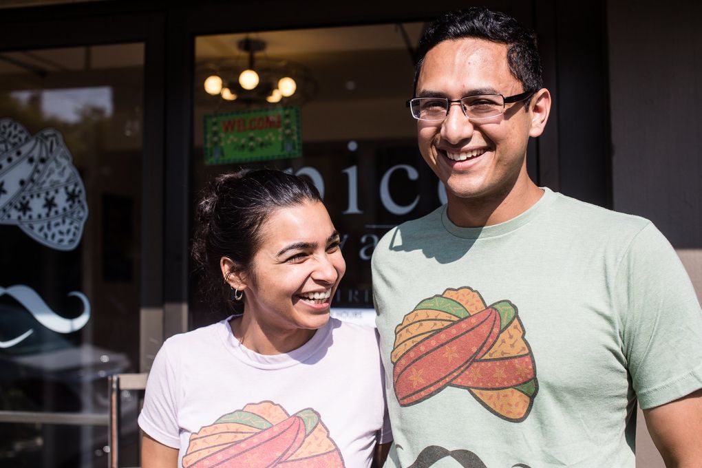 Wife-and-husband duo Aakanksha Sinha, left, and Uttam Mukherjee call their Spice Waala menu “Indian street food that is unapologetically authentic to us.” (Rebekah Welch / The Seattle Times)