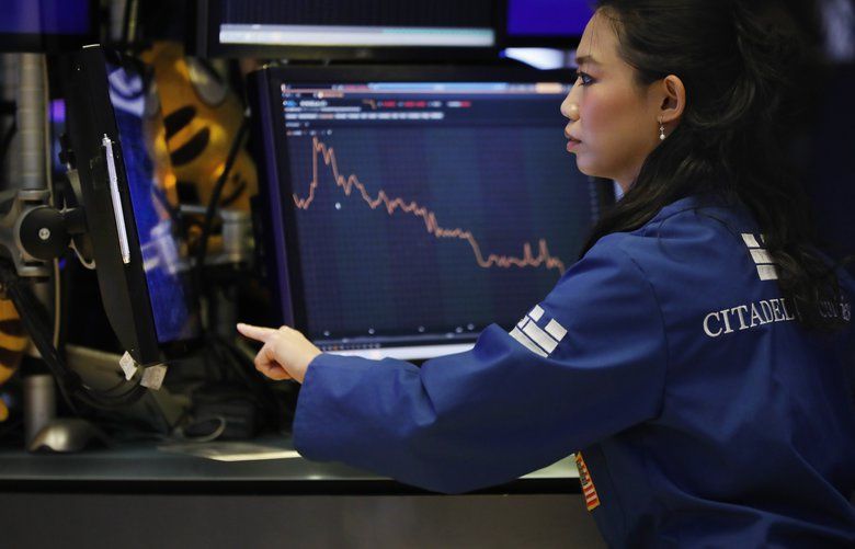 Stocks fall again on tradewar worries, capping a wild week The