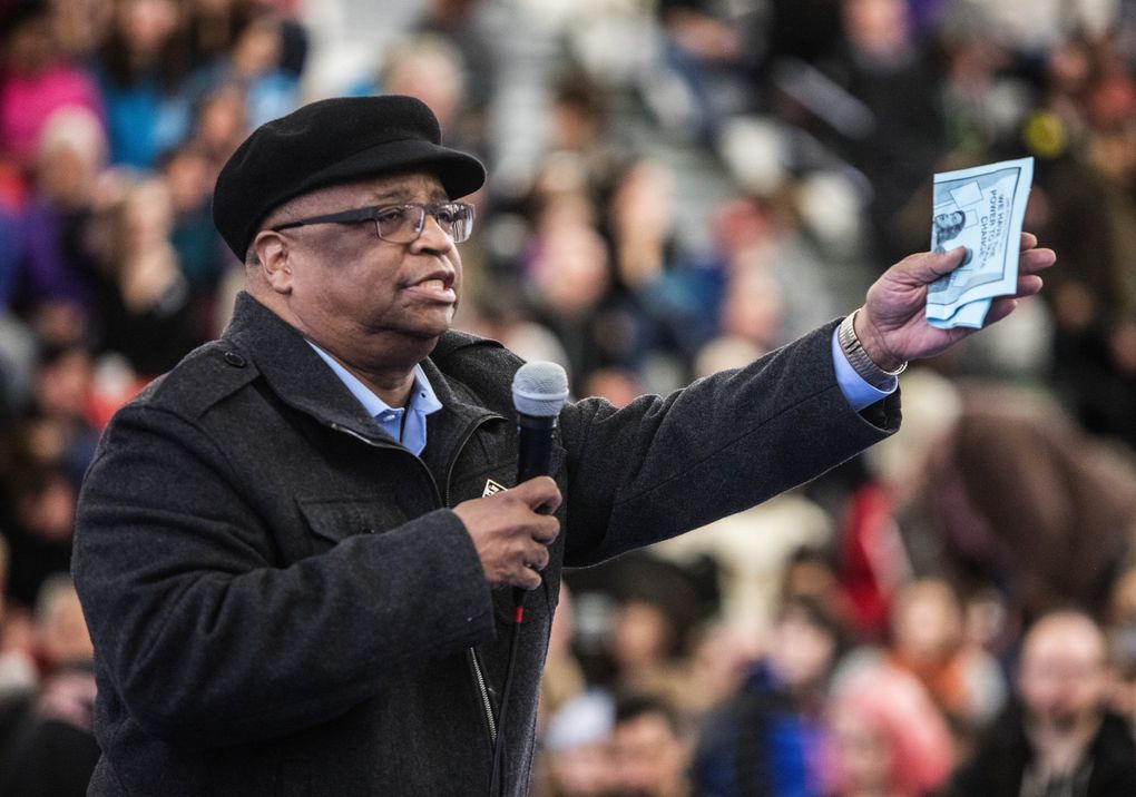 King County Councilmember Larry Gossett gives closing remarks at the Rev. Martin Luther King Jr. Day rally at Garfield High School in 2016. Gossett points to his legislative achievements in arguing for another term on the council. (Steve Ringman / The Seattle Times)