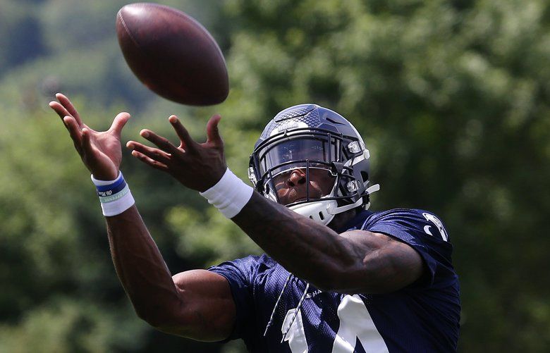 Wilson will sit out Seahawks preseason opener as Smith starts