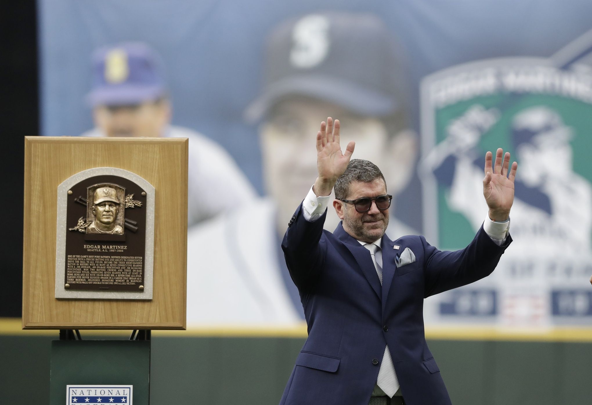 Former Seattle Mariners designated hitter Edgar Martinez, right, is greeted  by former teammate Ken Griffey Jr. while Martinez was being honored for his  recent induction into the Baseball Hall of Fame, before