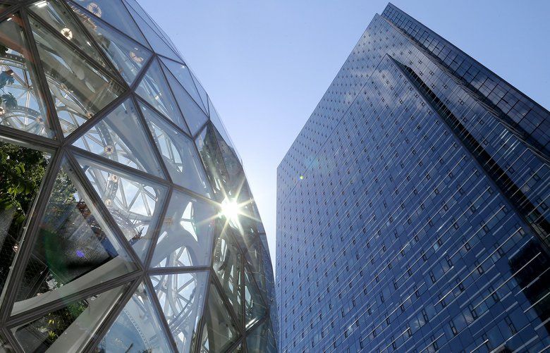 Amazon’s “Day One” tower, also known as Tower II, looms 37 stories above the Amazon Spheres, at left. The tower is located at 2121 7th Avenue and is 37 stories high. It opened November 7, 2016 and was designed by Seattle architectural firm NBBJ. 206740